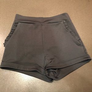 black fabric tight shorts